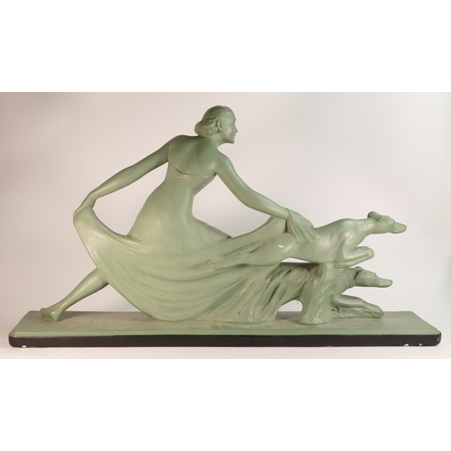 139 - Large Art Deco Painted Plaster Figure of Lady with Two Dogs. Green Body with Black Base. Length: 83c... 