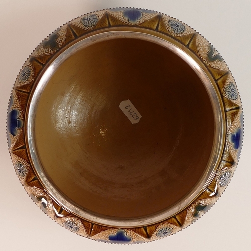 145 - Doulton Lambeth, Stoneware Bowl with Hallmarked silver rim. Decorated with scrolling foliage. Impres... 