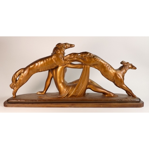 184 - Art Deco Bronzed Figure of a Reclining Lady with Leaping Greyhounds. Height: 36cm Width: 77cm.