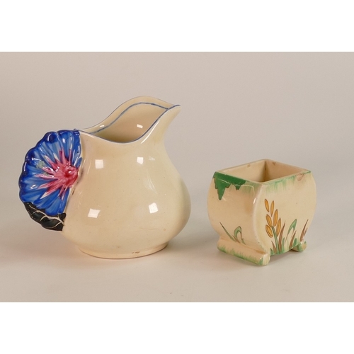 238 - Clarice Cliff Newport Pottery Floral Moulded Milk Jug together with a small Bizarre Sugar Bowl a/f. ... 