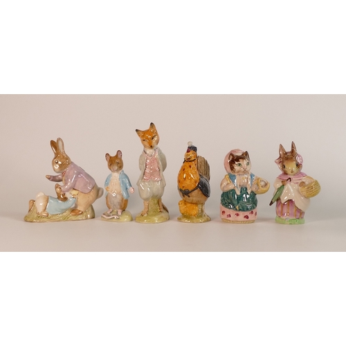 203 - A collection of Beswick Beatrix Potter BP3 to include   Mrs Rabbit, Mr Benjamin Bunny, Foxy Whiskere... 