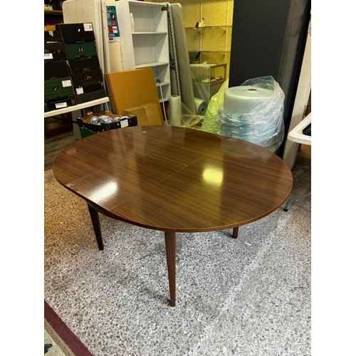 678 - Mid Century Modern Round Extending Formica Top Dining Table with 4 Matching Green Vinyl Upholstered ... 