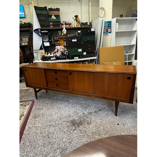 680 - Elliots of Newbury Mid Century Long Teak Sideboard with sliding doors - H7u8cm W220cm