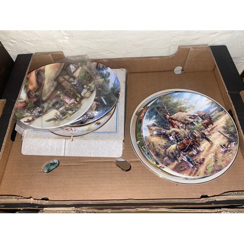 50 - A collection of Wedgwood and Royal Doulton decorative wall plates depicting country themes (1 Tray)