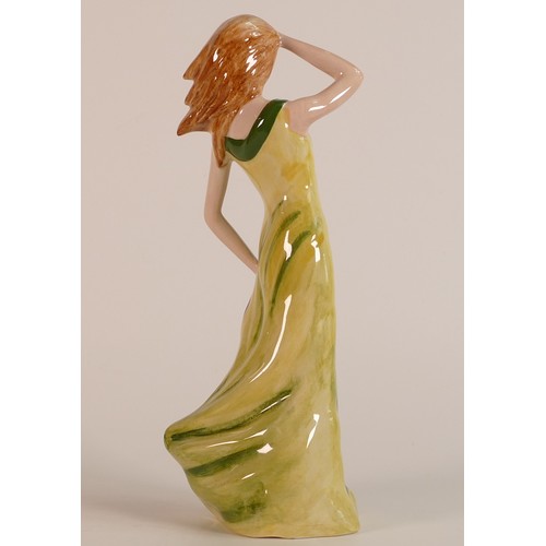 19 - Lorna Bailey, rare colour prototype of a lady with windswept hair in long green dress. Height: 24cm