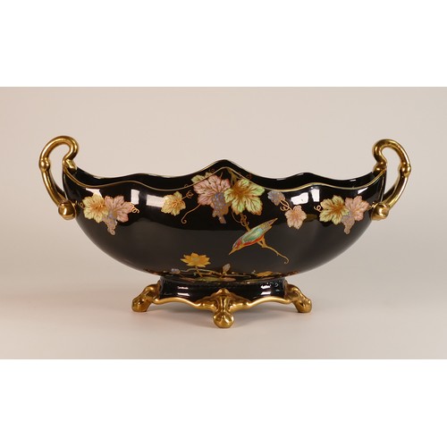 71 - Carlton Ware gondola shaped two handled gilded centre piece, Noire Royale, decorated with Kingfisher... 