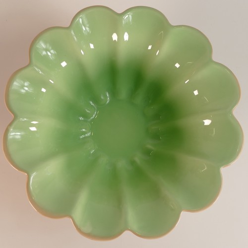 95 - Clarice Cliff for Newport Pottery, unusual floral form fruit bowl in GREY with green glazed interior... 