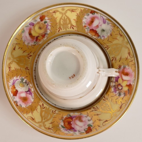 119 - Coalport, c.1820 Etruscan pattern 824 coffee cup and saucer. Hand painted floral reserves within gil... 