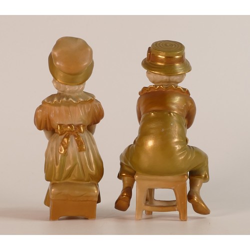 160 - Royal Worcester, two heavily Gilt Ivory Blush child figures. Height: 10.5cm (2)