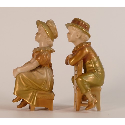 160 - Royal Worcester, two heavily Gilt Ivory Blush child figures. Height: 10.5cm (2)