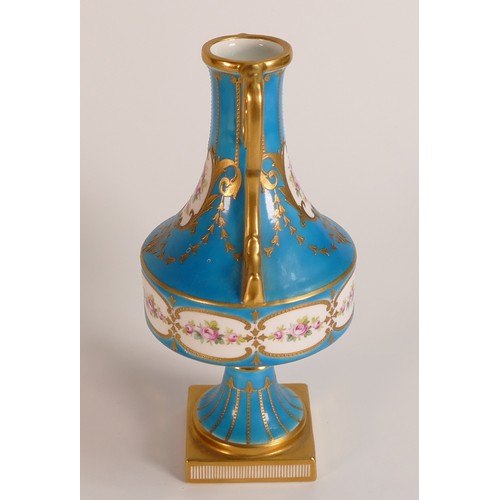 182 - Mintons two handled gilded vase, decorated with hand painted panels of roses, on light blue ground, ... 