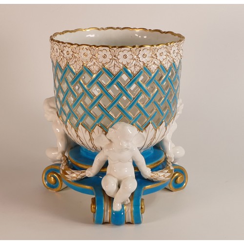 183 - Mintons gilt decorated figural centre piece, c1875, with open latticework bowl, supported by three w... 