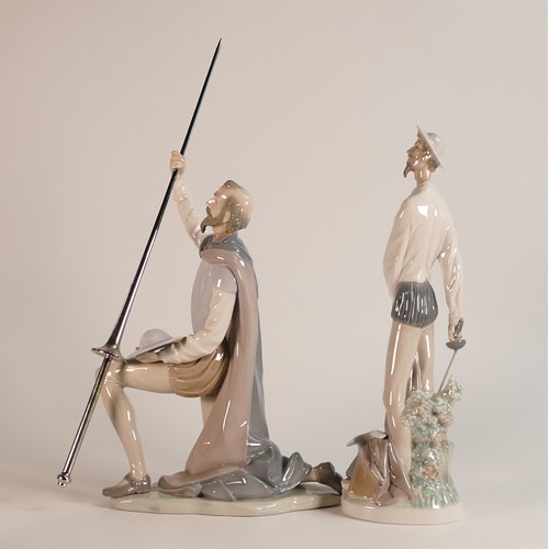 203 - Two Lladro Porcelain figures of Don Quixote. One knelt with lance in hand, the other in fighting sta... 