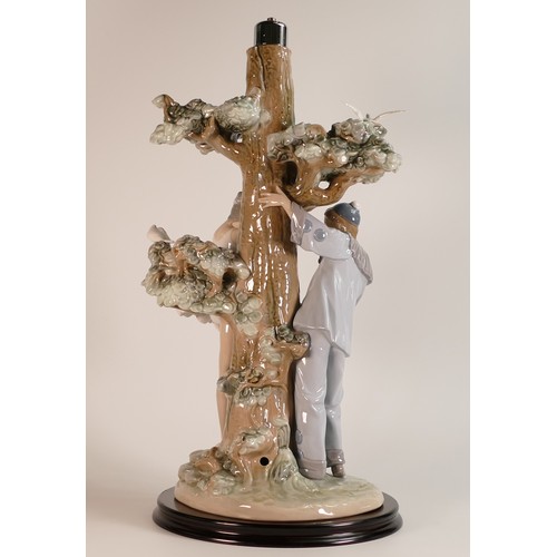 205 - Large Lladro Pierrot and Ballerina figural lamp. Modelled in the form of a Pierrot at play with a Ba... 