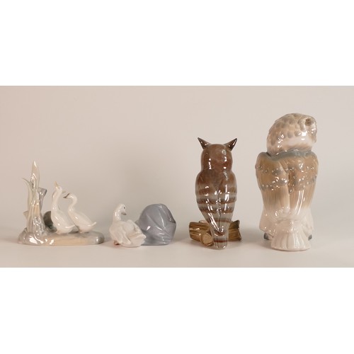 206 - Four Lladro figures including - Long Eared owl, larger owl, swan and goslings and geese in naturalis... 