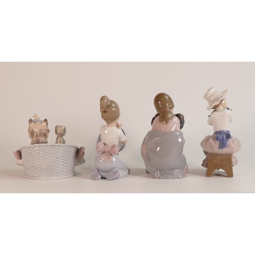 207 - Four Lladro figures including Yorkshire terriers in a basket, girl with a dog in a sunhat and two fi... 