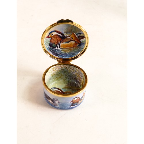 217 - Moorcroft enamel Mandarin duck lidded box by Nigel Creed. Limited edition 1/3. Boxed, diameter 5.5cm