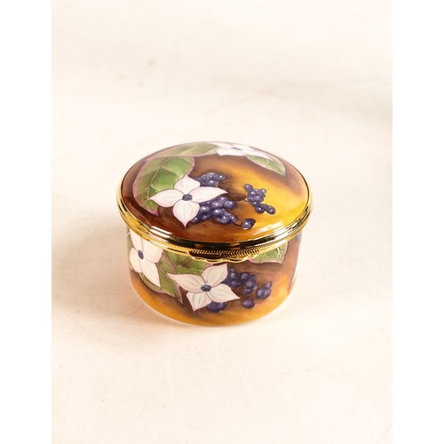 254 - Moorcroft enamel Dogwood round lidded box by Anji Davenport. Limited edition 70/100. Boxed, diameter... 