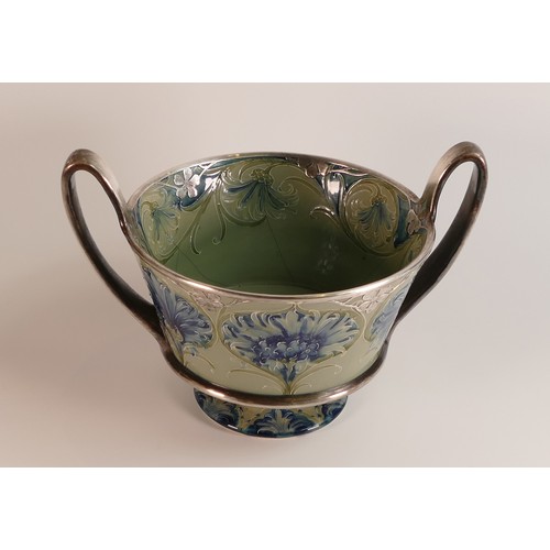 276 - William Moorcroft Florian Cornflower Shreve & Co. two handled cup, with unmarked silver mounts, base... 