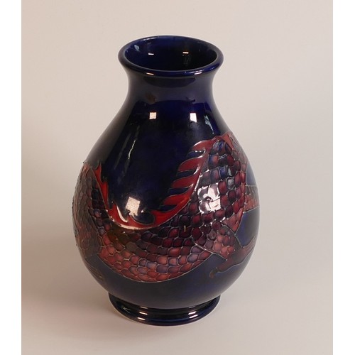 280 - Moorcroft Dragon design baluster vase. Height: 20cm