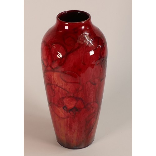 288 - Moorcroft Flambe vase in the Fuchsia design. Potter to the Queen Sticker to base. Height: 30cm