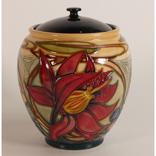 330 - Moorcroft, Hartgring design jar and cover. Red dot seconds. Height: 15cm