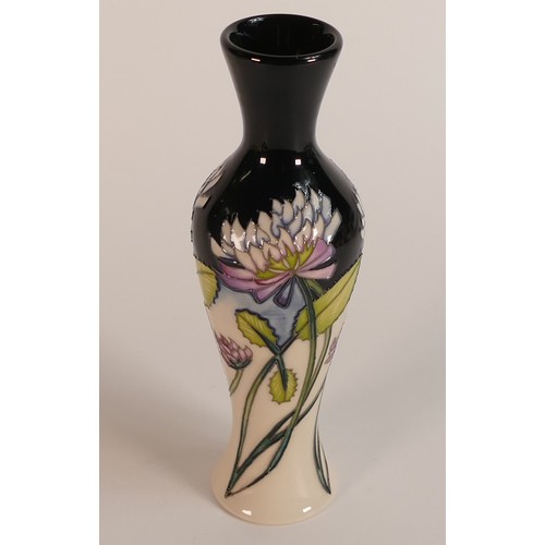 333 - Moorcroft, Trefoil design Baluster vase. Red dot seconds. Height: 21cm