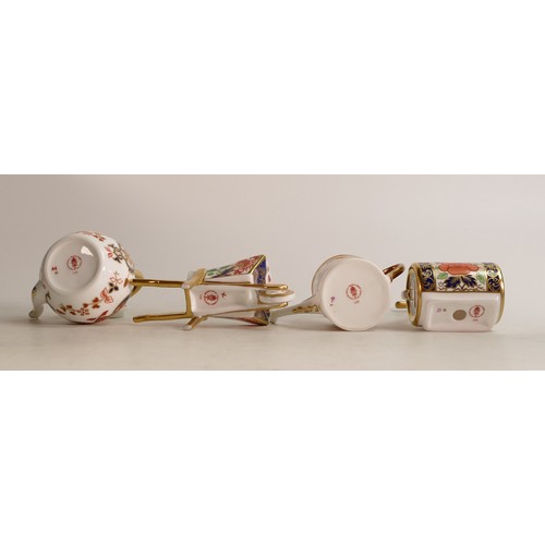 378 - A Royal Crown Derby Imari miniature model Garden Roller together with Watering Can, Wheelbarrow and ... 