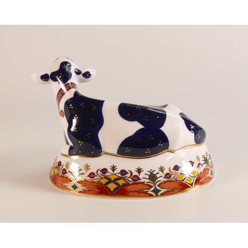 410 - Royal Crown Derby paperweights Friesian Cow 'Buttercup', gold stopper, boxed.