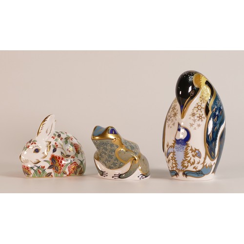 428 - Three Royal Crown Derby paperweights to include Penguin with Chick, Fountain Frog and a Meadow Rabbi... 