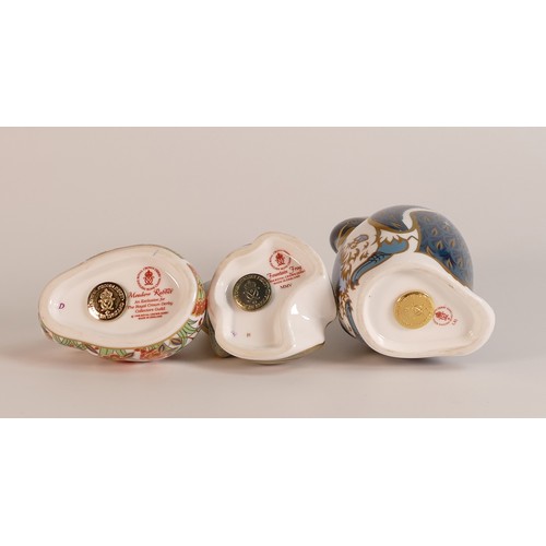 428 - Three Royal Crown Derby paperweights to include Penguin with Chick, Fountain Frog and a Meadow Rabbi... 