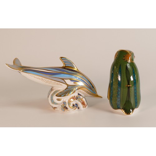 432 - Royal Crown Derby paperweights Dolphin and Rockhopper Penguin, gold stopper, boxed, with a cert. (2)