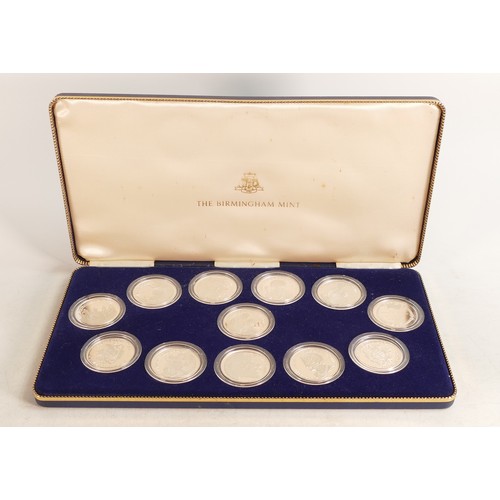 1784 - 12 x 1980 hallmarked silver medallions, each weighing 25.6g, appx.  Cased.