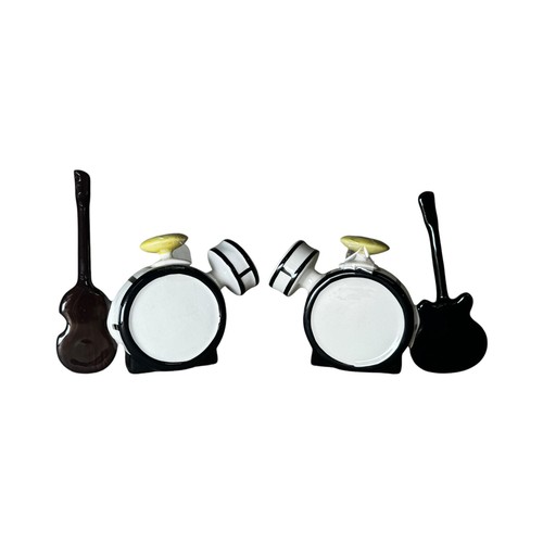 28 - Lorna Bailey 'The Beatles Story' pair of teapots modelled as a drum kit. One features a model of Pau... 