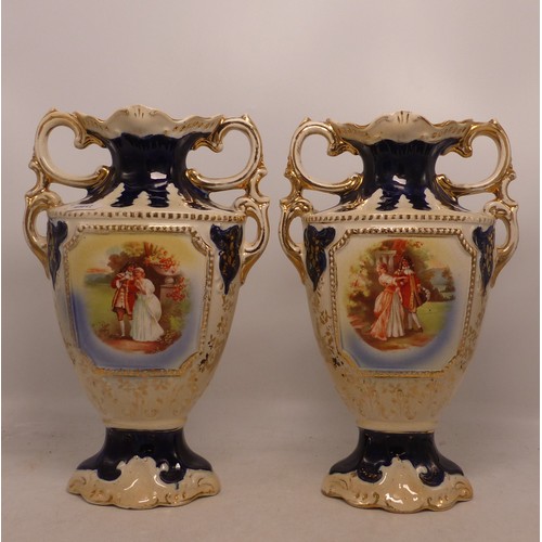 41 - A Pair of Victorian Cobalt Blue and Gilt Mantle Vases. Printed romantic scenes to front. Height: 27c... 