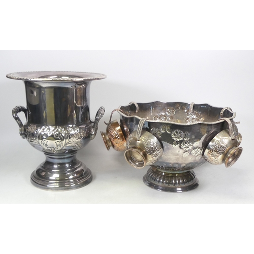 546 - A Silverplated Punch Bowls including Cups together with a Campana Urn shape Ice Bucket. (2)