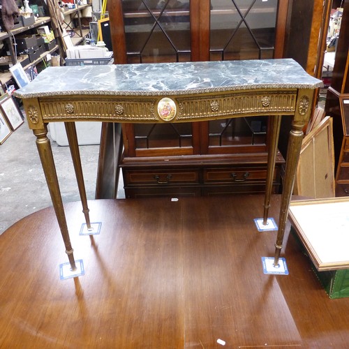 663 - Italian style tall marble top console table. Gilded wood frame with oval ceramic insert depicting a ... 