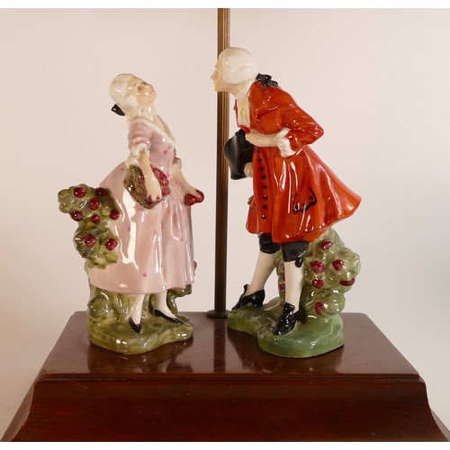 318 - A pair of Royal Doulton figures Masquerade HN600 attached to wooden lamp base with shade. Height of ... 