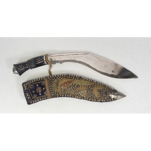 409 - An Indian Souvenir Kukri Knife. Scabbard is of velvet with metal thread decoration. and white metal ... 