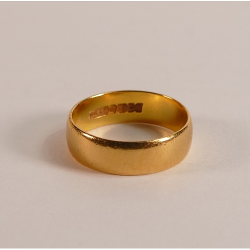 700 - 22ct gold wedding ring, size J, 3.6g.