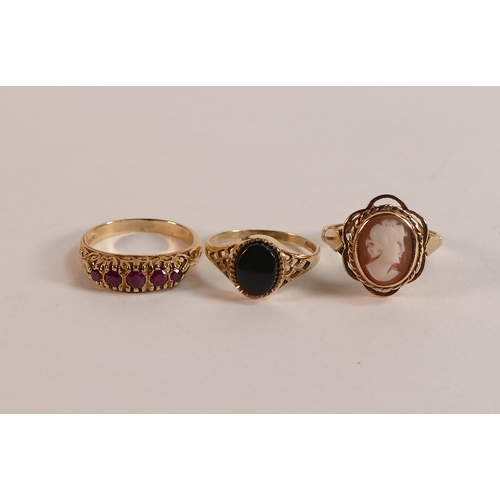 707 - Three 9ct gold dress rings, each stone set with, cameo, Onyx and red stones, sizes J-K, 7.1g. (3)