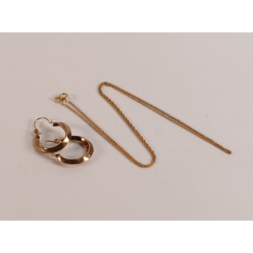 713 - 9ct gold pair earrings and 9ct gold thin necklace, 2.2g.