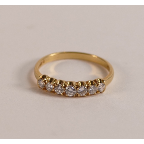 715 - 18ct gold seven stone diamond ring, size N, 2.1g.