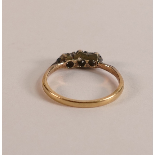 736 - 18ct gold ring set with white stones, size L,1.9g.