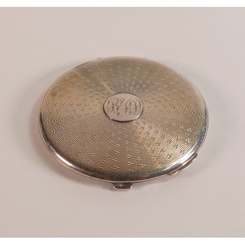 745 - Silver compact, diameter 7cm,65.8g.