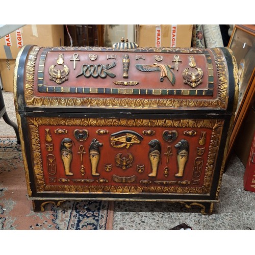 609 - A Modern Domed Chest of Egyptian Inspired Design. Painted in vivid red and gold palette. Height: 67c... 