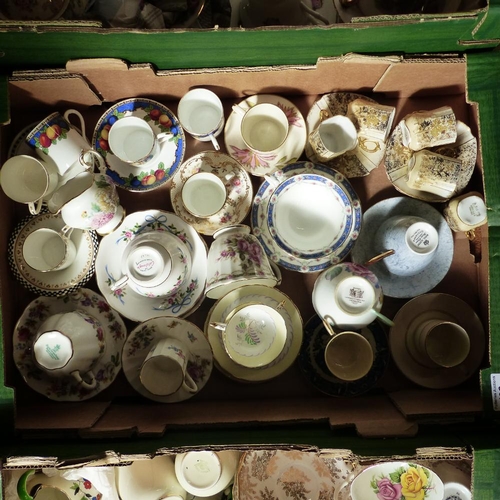 122 - A large collection of assorted teacups saucers, mini teapots etc 3 trays