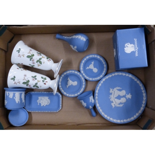 589 - Wedgwood, A Collection Blue Jasperware ornaments, vase, bell and dishes and two Wild Strawberry Vase... 