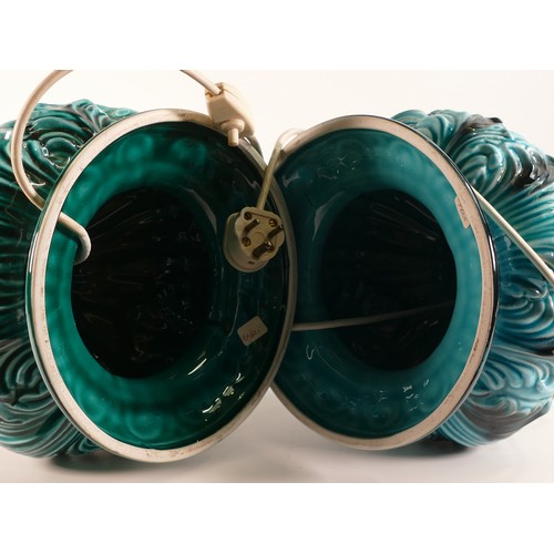 34 - A pair of mid-century Italian Majolica lamps. Turquoise body with white metal fittings. Height to fi... 