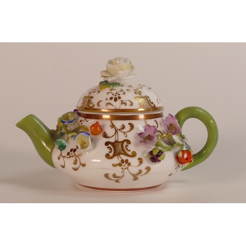 36 - Meissen, 19th century florally encrusted tea pot. a/f. Height: 6cm